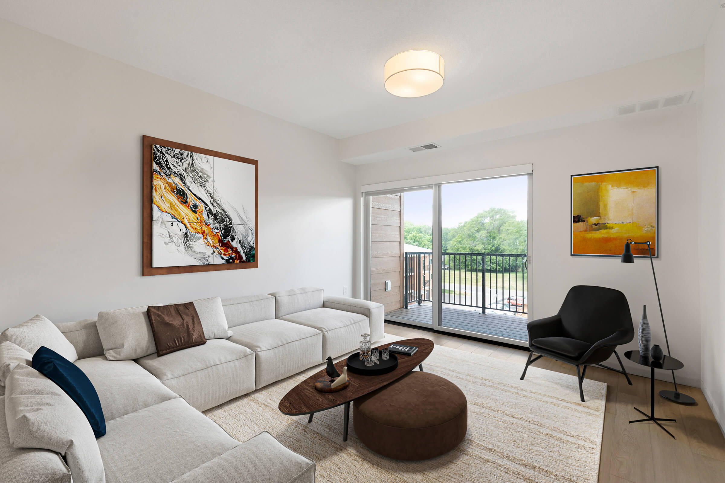 Staged living room with modern decor and patio view