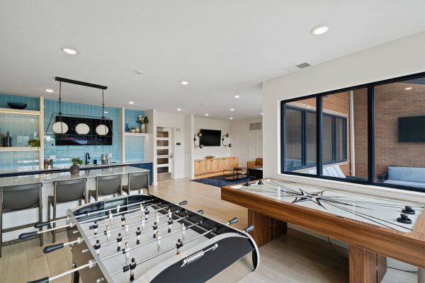 Bedroom with a large window and neutral decor